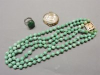 Lot 68 - A three row Peking glass bead necklace