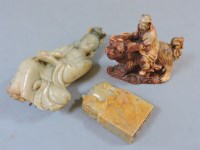 Lot 96 - A Chinese soapstone carving of a deity carving of an immortal on a Buddhist lion
