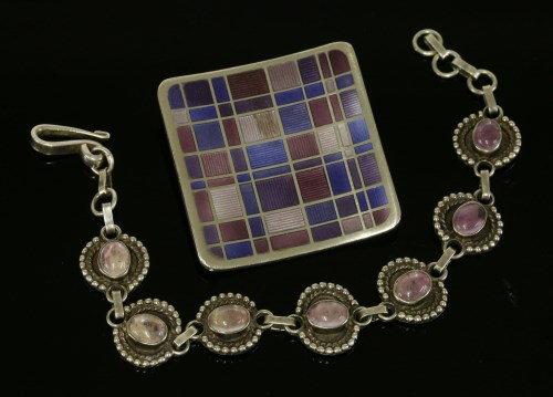 Lot 15 - A sterling silver enamelled brooch