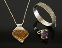Lot 24 - A sterling silver modernist amethyst ring