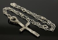 Lot 20 - A sterling silver garnet set ankh-style cross