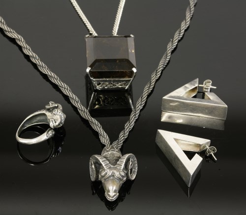 Lot 23 - A silver ram's head necklace