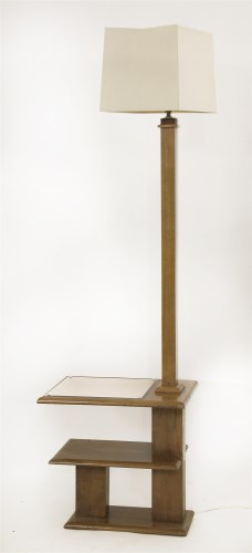 Lot 143 - An Art Deco walnut two-tier lamp standard