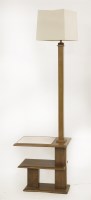 Lot 143 - An Art Deco walnut two-tier lamp standard
