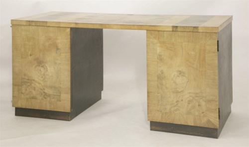 Lot 212 - A walnut parquetry top desk