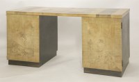 Lot 212 - A walnut parquetry top desk
