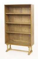 Lot 607 - An Ercol elm bookcase