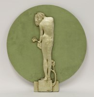 Lot 199 - An Art Deco patinated metal and painted wood roundel