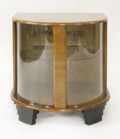 Lot 178 - A walnut demilune display cabinet