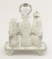 Lot 131 - A George III silver eight-bottle cruet stand