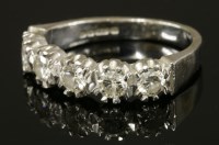Lot 580 - An 18ct white gold five stone diamond ring