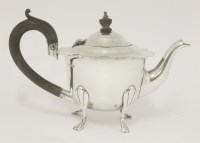 Lot 115 - A silver teapot