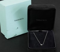 Lot 564 - A platinum single stone diamond pendant