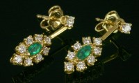 Lot 534 - A pair of emerald and diamond gold drop earrings
