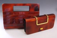 Lot 450 - A tortoiseshell-coloured plastic ribbed handbag