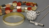 Lot 12 - A Halcyon Days gold-plated hinged bangle