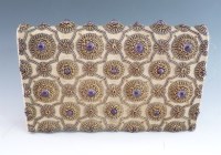 Lot 505 - A 20th century metallic silk and gem set evening clutch bag