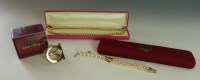 Lot 4 - A Salvatore Ferragamo gold tone Gancio clasp scarf clip