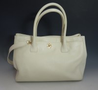 Lot 407 - A Chanel white caviar lambskin leather executive tote shopper handbag