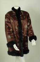 Lot 323 - A brown Chinese woven silk fabric coat