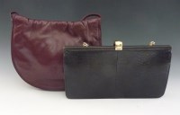Lot 507 - A Loewe burgundy leather circular handbag