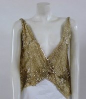 Lot 305 - A 1920s cream beaded sleeveless jacket