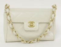 Lot 395 - A Chanel mini iridescent caviar quilted lambskin flap bag