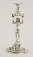 Lot 174 - A George II silver harlequin taperstick