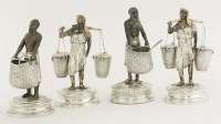 Lot 30 - An unusual matched set of four silver and stained ivory condiments