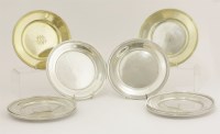 Lot 21 - A set of eight American metalwares side plates