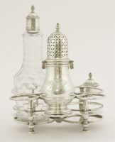 Lot 77 - A Queen Anne silver warwick cruet frame