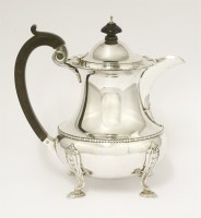 Lot 202 - A Scottish silver hot water jug