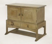 Lot 89 - A Cotswold School oak low cupboard
