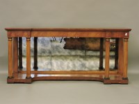 Lot 608 - A reproduction inverted breakfront console table