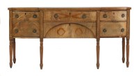 Lot 727 - A George III strung mahogany breakfront sideboard