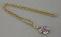Lot 14 - An amethyst cluster pendant