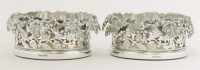 Lot 51 - A pair of Victorian silver-plated coasters
