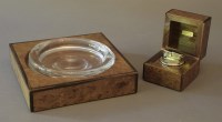 Lot 153 - A Gucci table lighter and ashtray