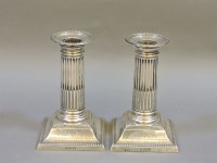Lot 226 - A pair of weighted silver candlesticks