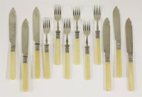 Lot 152 - A set of six pairs of Edwardian silver fish eaters