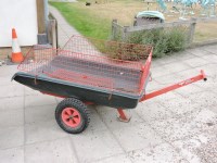 Lot 521 - A pull along trailer/barrow