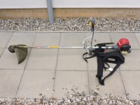 Lot 526 - A Honda GX25 four stroke petrol strimmer