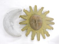 Lot 262 - A modern folk art carved wooden sun and moon