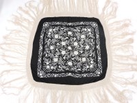 Lot 319 - A black ground piano shawl