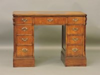 Lot 397 - A Victorian style mahogany kneehole desk