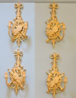 Lot 137 - A set of four modern gilt heightened wall lights