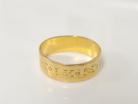 Lot 8 - A 22ct gold wedding ring