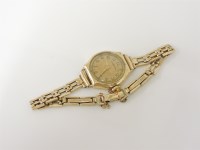 Lot 9 - A 9ct gold ladies Winegartens mechanical strap watch