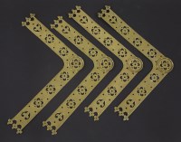 Lot 96 - Four Victorian Gothic brass corner door plates