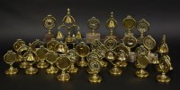 Lot 134 - Twenty-five brass horse harness swingers